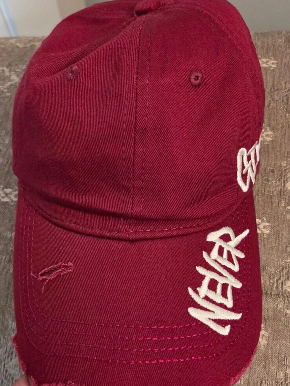 Maroon Baseball Cap with 'Never Give Up' Embroidery
